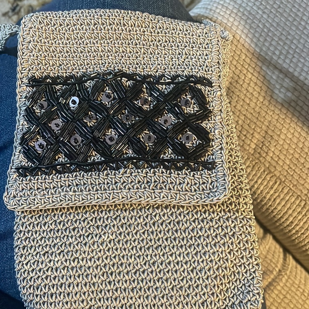 THE LIMITED handmade woven purse with attached matching coin purse.